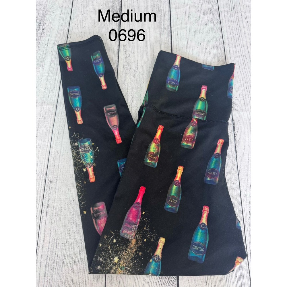 Evolution and Creation Champagne Bottle Leggings Black Medium NYE Celebration